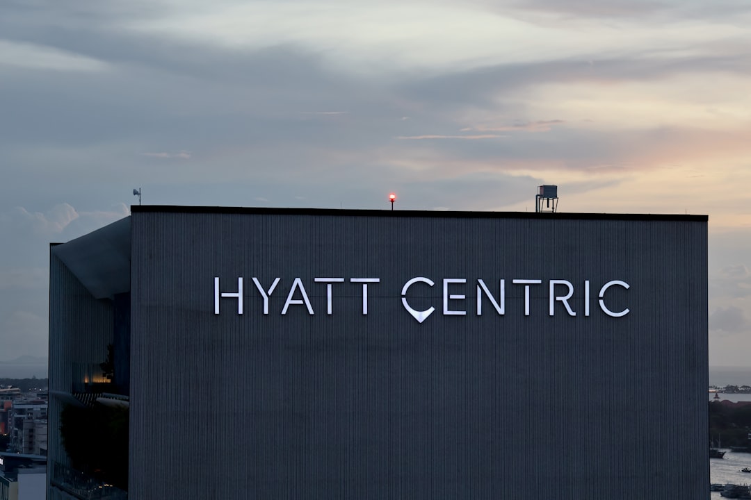 Hyatt centric building exterior with logo at dusk