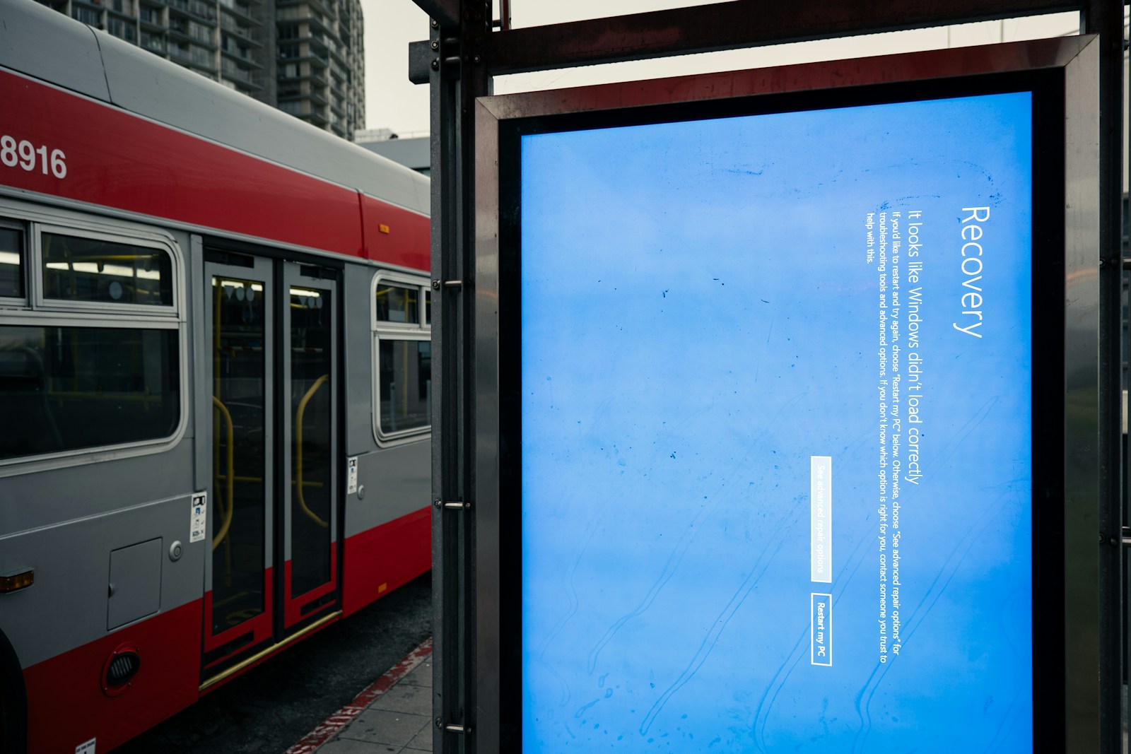 A bus stop with a bus parked next to it — Azure DevTest Labs - Geliştirme ve Test Ortamı Yönetimi